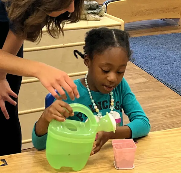 PREP Preschool Readiness Enrichment - child learning science watering plant