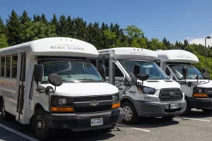 Merit School of Doc Stone - new bus fleet