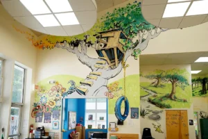 Merit School of Wellington - beautiful treehouse murals in the Youth Zone before and after school program area for school age children
