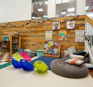 Merit School of Wellington - reading circle in the Youth Zone before and after school program area for school age children