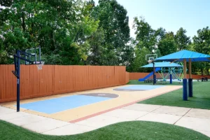 Merit School of Wellington - basketball court on the school age children's playground